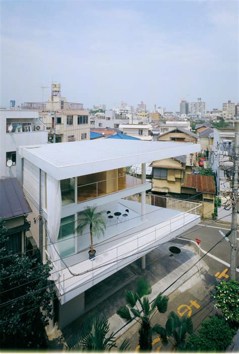 wood shutters on metal house|curtain wall house tokyo.